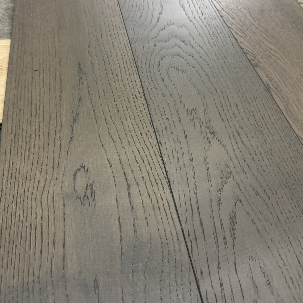 Close-up of Virgil oak planks showing the wire-brushed grain