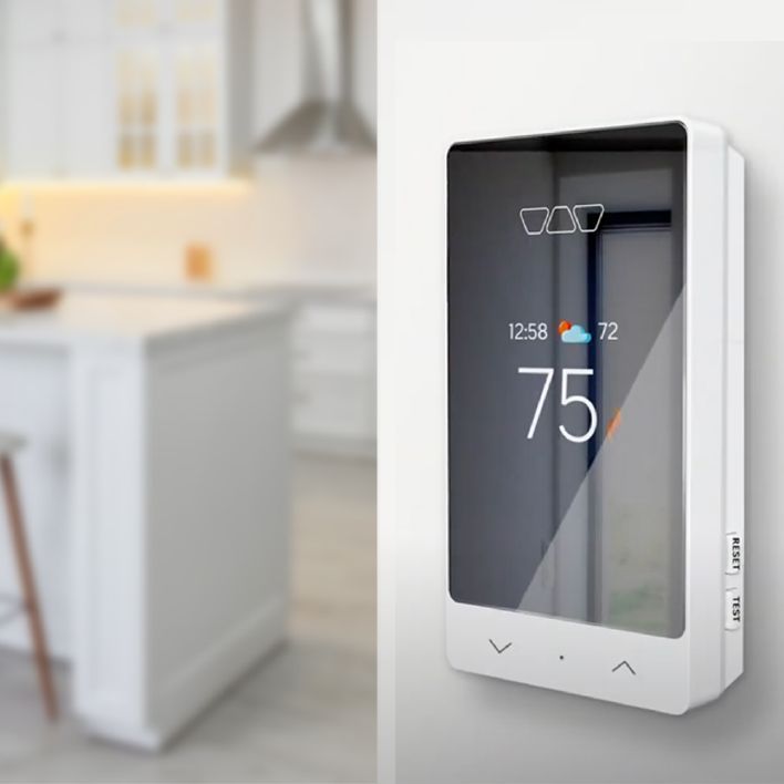Step 4 — Wall-mounted DITRA-HEAT smart thermostat showing 75°F with weather display