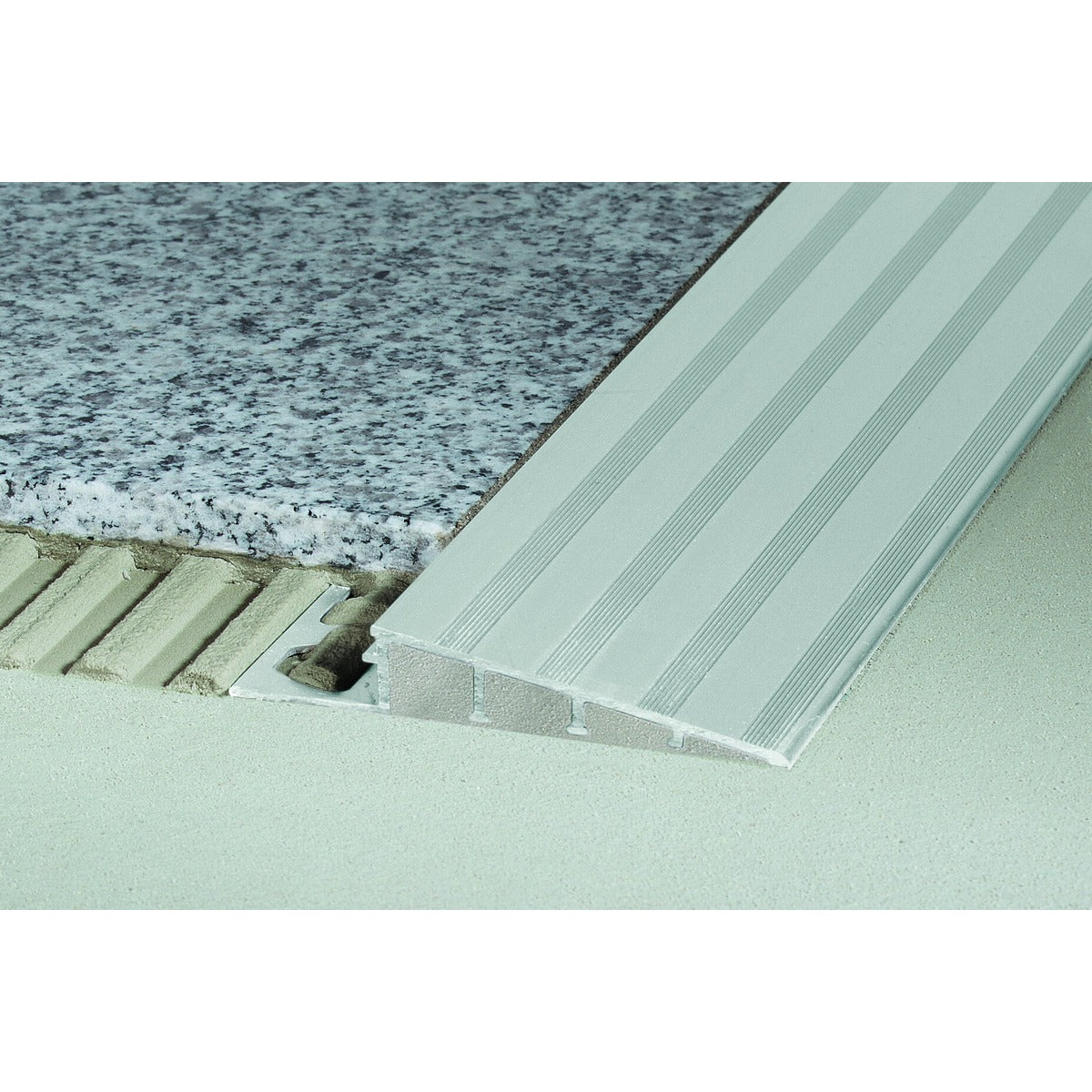 Schluter® RENO-RAMP Reducer, Anodized Aluminum, installed